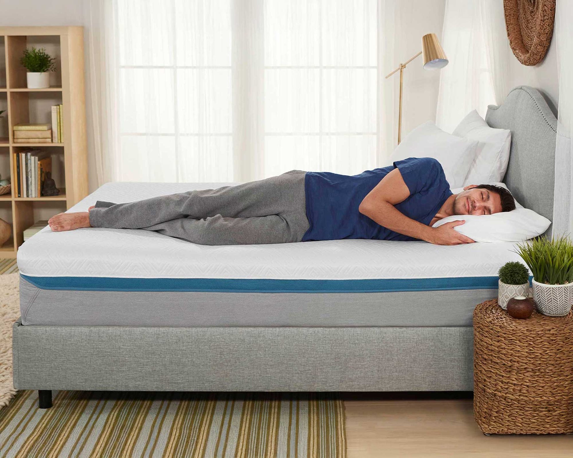 Man laying on a Therapedic 1200 Memory Foam Mattress