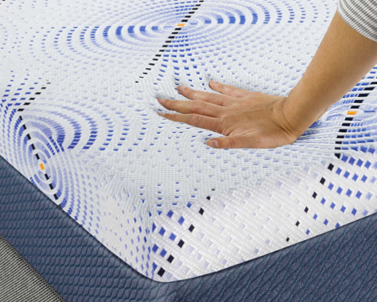 hands pressing on agility mattress