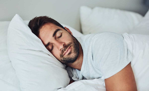 a man sleeping on his new agility mattress