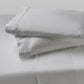 Two agility cool foam pillows stack on top of each other with High Rise Grey pillow sheets