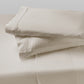 Sheet set with two pillows stacked on top of each other in Moonbeam Linen color