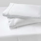 Two agility cool foam pillows stack on top of each other with Bright White pillow sheets